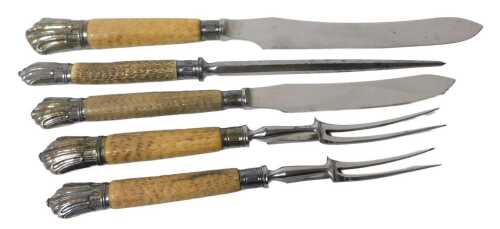 A Victorian horn and silver handled five piece carving set, comprising two knives, two forks,...