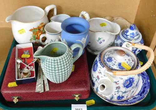 Ceramics, to include a Clarice Cliff jug in teal blue with a sweetcorn textured design, a...