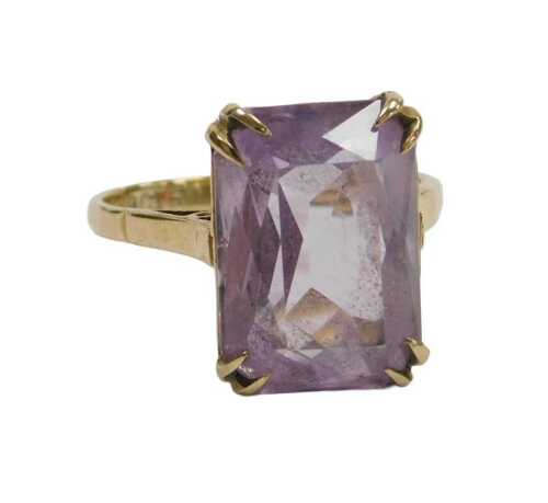 An amethyst single stone ring, the rectangular cut amethyst in a basket setting, in yellow metal,...