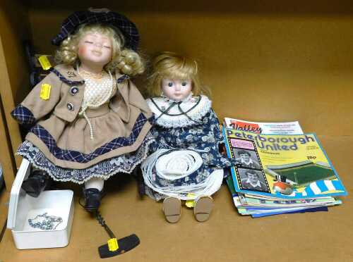 Miscellaneous items, to include two porcelain faced and limbed dolls, dressed in Victorian...