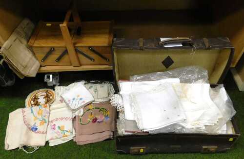 Linens and crochet, to include embroidered linen napkins, place settings and table runners,...