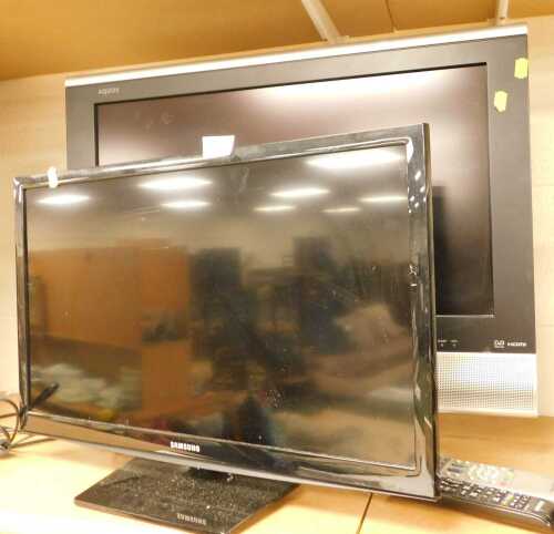 A Samsung 23" television, a common model UE24H4003AW, with lead and remote, together with a...