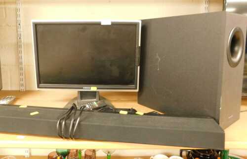 A Panasonic home theatre audio system bar, model number SU-HTB490, a Panasonic active subwoofer,...