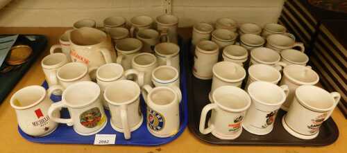A group of Franklin porcelain official tankards of the world's great breweries, to include Becks,...