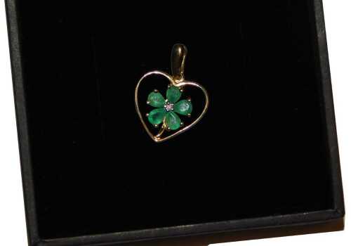 A 9ct gold emerald and diamond heart and flower shaped pendant, for Gems TV, with certificate,...