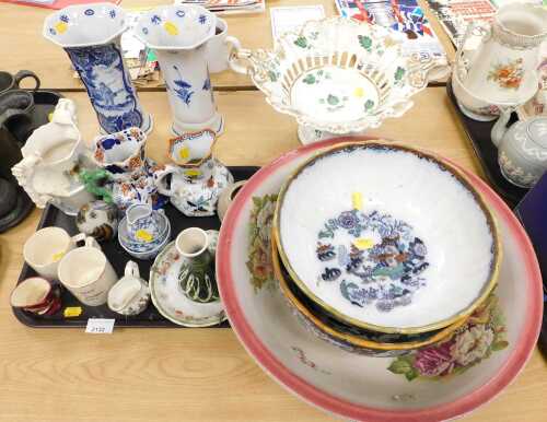 A Davenport porcelain twin handled pedestal dish, 16cm high, together with a pair of Delft blue...
