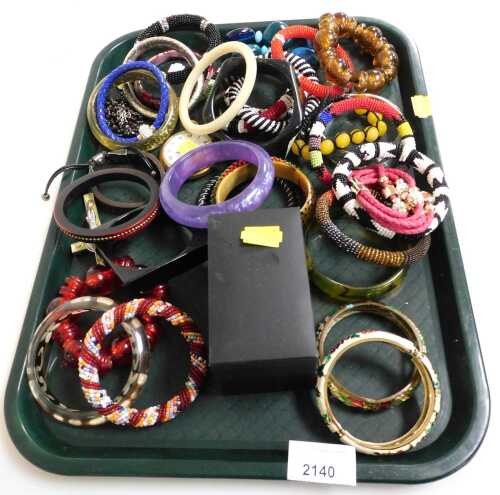 Various plastic and other bangles, to include a Miss Sixty bangle, a Smiths open face pocket...