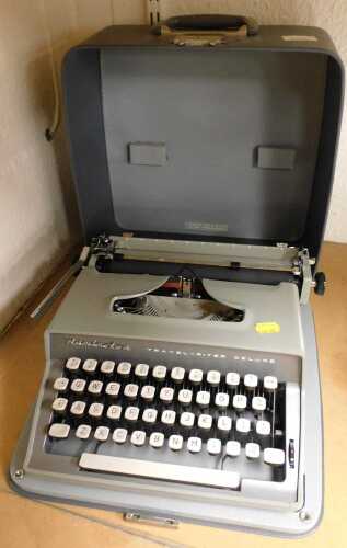 A Remington Travel-Riter Deluxe typewriter.