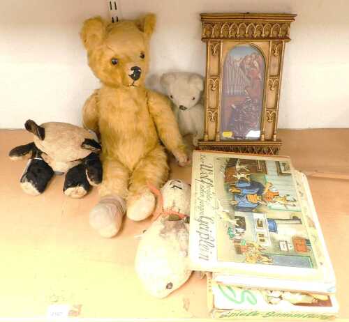 A group of articulated early and mid 20thC Teddy bears, to include a panda and a golden bear,...