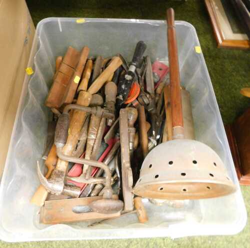 Woodworking tools, to include a wetstone, hammers, hand drills, spirit level, rasps, a copper...