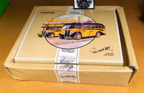 A pair of Corgi limited edition Southall buses, in yellow, boxed.