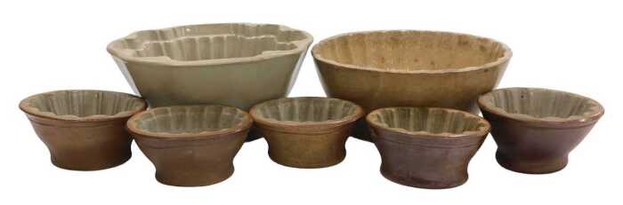 A group of 19thC and later pottery jelly and mousse moulds, largest mould 18.5cm wide. (7)