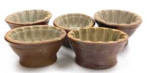 A group of 19thC and later pottery jelly and mousse moulds, largest mould 18.5cm wide. (7) - 2