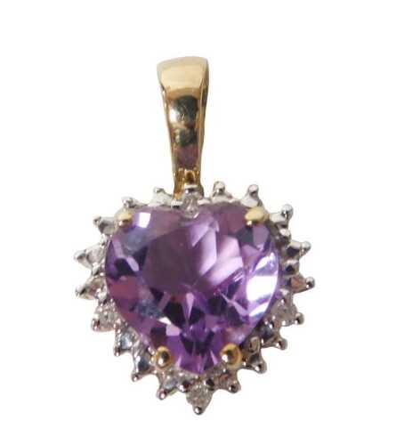 A 9ct amethyst and diamond heart shaped pendant, for Gems TV, with certificate, boxed, metal...