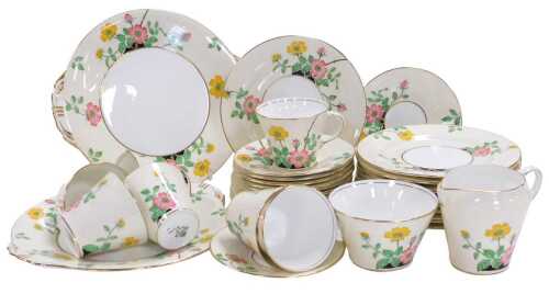 An early 20thC Aynsley porcelain part tea service, printed and painted with flowers, pattern...
