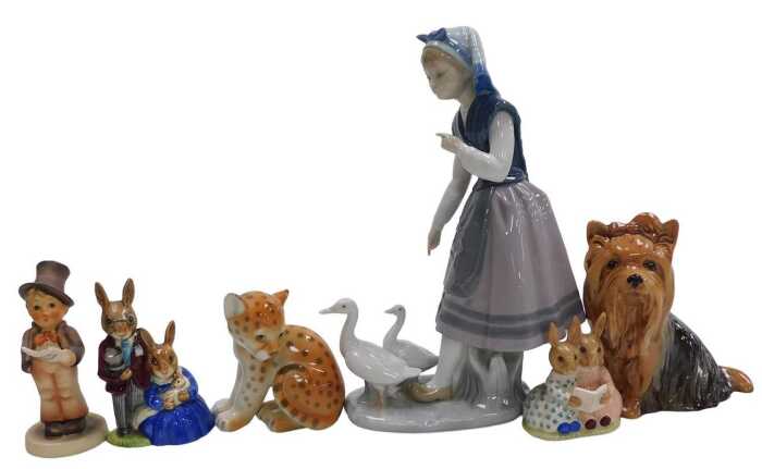 A Lladro porcelain figure of a girl with ducks, no. 5202, together with a Royal Doulton...