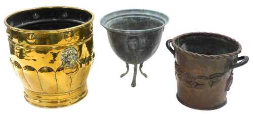 A Victorian brass jardiniere, with lion's head and ring handles, 26cm high, a Roman style urn,...