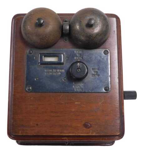 An early 20thC domestic telephone switchboard, oak cased, originally from a carpet and furniture...