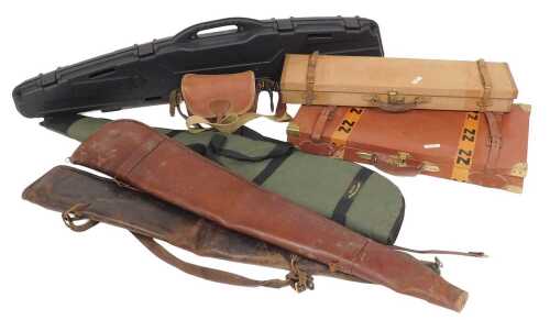 Assorted gun cases, including leg o' mutton cases, a brass bound tan leather double gun case,...