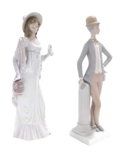 A Lladro porcelain figure of a lady, holding a handkerchief and with a tied bag, 35.5cm high,...