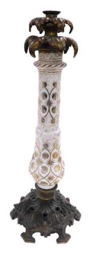 A late 19thC Continental white flash overlay glass and brass table lamp base, with a two tier...