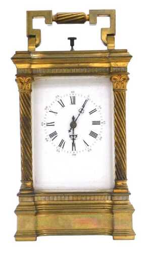 A late 19thC brass repeater carriage clock, rectangular enamel dial bearing Roman and Arabic...
