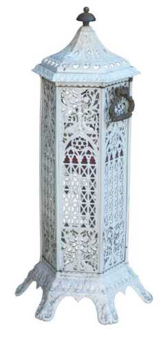 A Victorian white painted cast iron cathedral type conservatory heater, of hexagonal form, with...