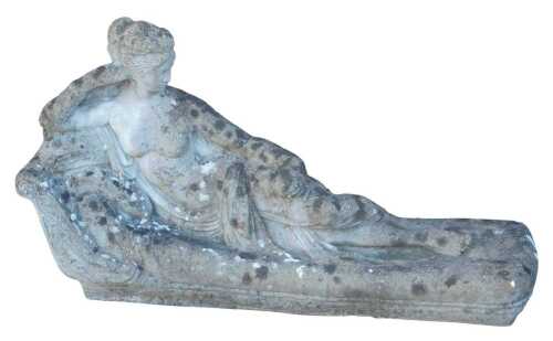A reconstituted stone garden statue, modelled as a classical reclining lady on a chaise, 89cm wide.