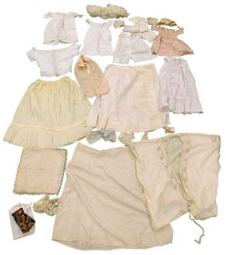 Victorian and later linen and lace garments, including baby's caps, child's skirts and tops, a...