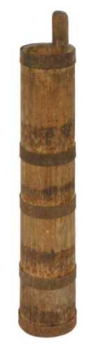 A vintage wooden and cast iron bound coopered butter churn, 81cm high.