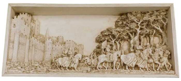 A Marcus Designs plaster wall picture The Cavalcade, decorated in high relief, within a green...