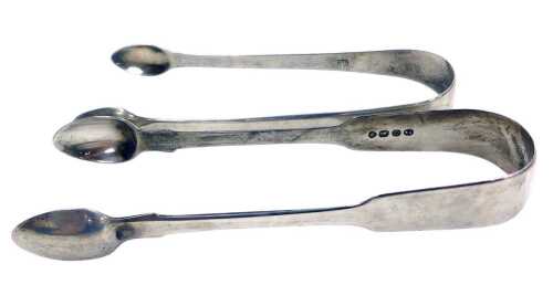 A pair of George IV silver sugar tongs, London 1829, and a further pair of Georgian sugar tongs,...