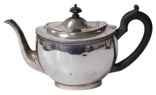 A George V Scottish silver teapot, with a gadrooned rim, Hamilton & Inches, Edinburgh 1914,...