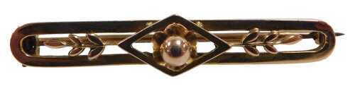 A Victorian bar brooch, of oval form, with leaf and ball decoration, yellow metal, stamped 9ct,...