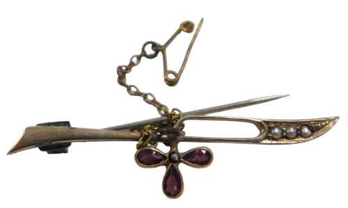 A Victorian amethyst and seed pearl shamrock bar brooch, with safety chain, yellow metal,...