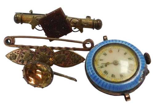A Victorian goldstone Nanny brooch, two further brooches, a lady's gold plated and turquoise...