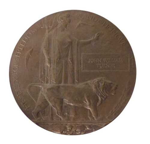 A World War I widow's penny, named to John William Turner, with the enclosed note of gratitude...
