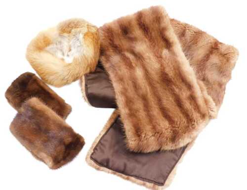 A mink stole, two mink cuffs, and a fox fur hat.