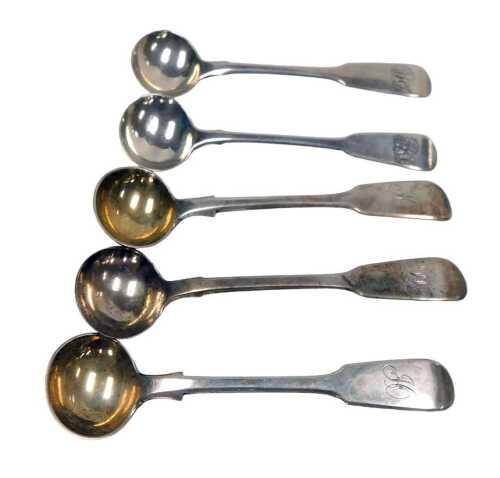 Five Georgian and later silver Fiddle pattern mustard spoons, monogram engraved, 1.74oz.