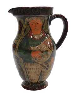 A late 19th/early 20thC pottery jug, possibly Scandinavian, painted with a man holding a goose...