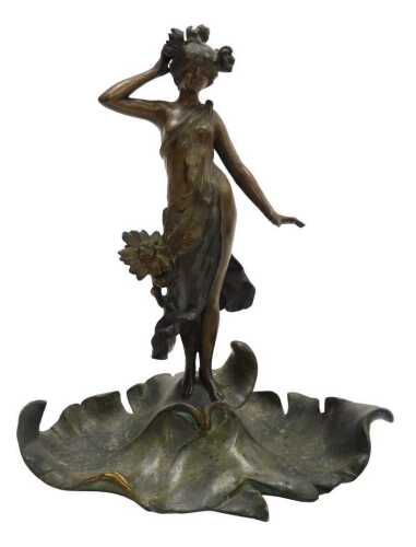 A late 19thC Art Nouveau patinated metal sculpture, of a standing lady in a diaphanous garment,...
