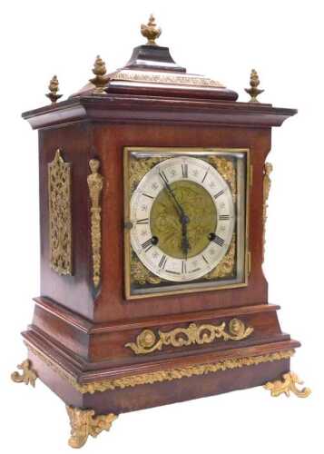 A late 19thC American mahogany cased bracket clock, square brass dial with cherub spandrels,...