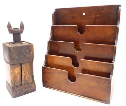 A late 19thC oak and cast iron wagon jack, 24cm high, and a Victorian mahogany four division...