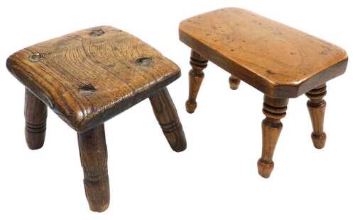 A 19thC oak milking stool, engraved under the seat JME, 18cm wide, and a further oak stool,...