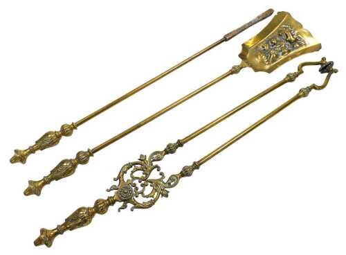 Three Victorian brass fire implements, comprising shovel, poker, and fire tongs.