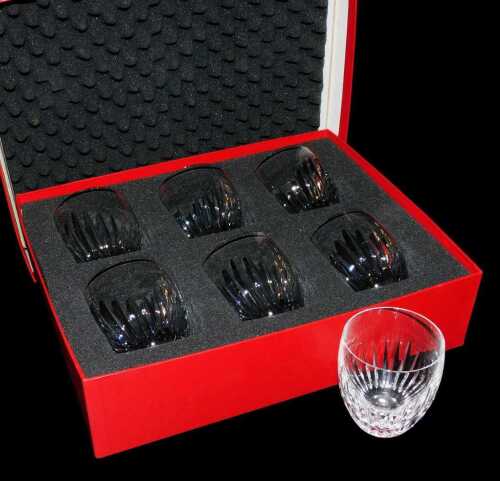 A set of six Baccarat cut glass tumblers, boxed, and a further tumbler. (7)