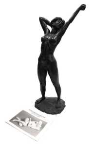 A late 20thC cold cast bronze sculpture of Claire Stretching, by Tom Greenshields, limited...