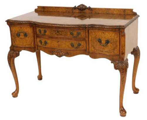 A Maple burr walnut and walnut crossbanded serpentine fronted sideboard, with two frieze drawers,...