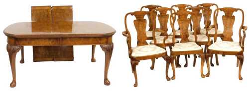 A burr walnut and walnut cross banded draw leaf dining table, possibly Maple, with two...