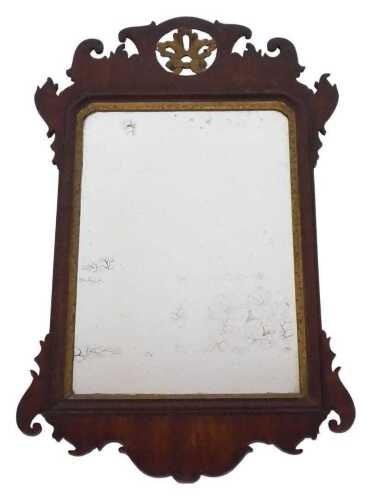A Georgian style fretwork wall mirror, with a carved and gilded pediment, and a rectangular...